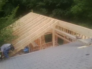Framing a new roof addition that ties into an existing shingle roof in Wynnewood