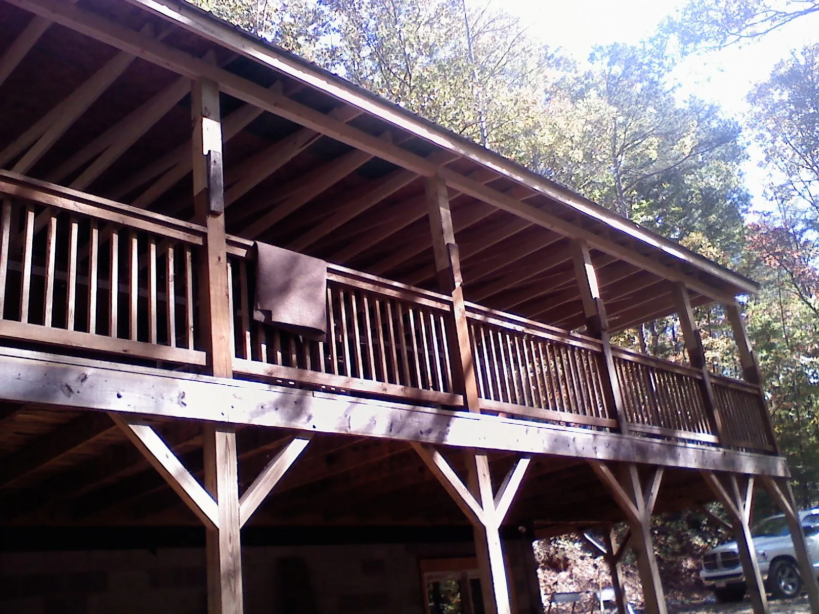 Timber framing under a new elevated porch and deck — Roof Leak Repair in Wynnewood by Roofing Brothers